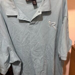 light blue polo shirt is a vintage piece Rocawear